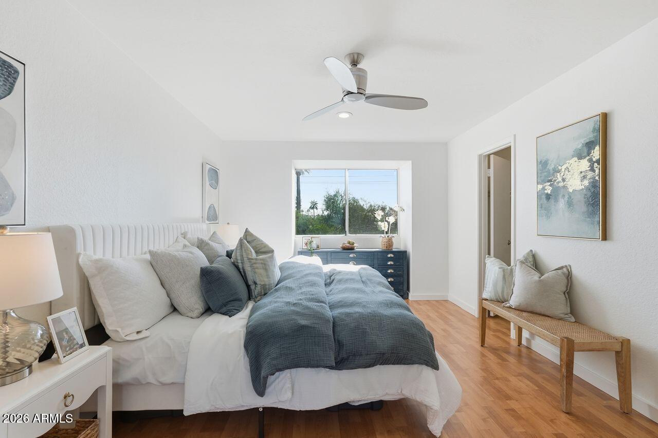 1012 East Osborn Road, Unit E Phoenix, AZ 85014 - Photo 14 of 22 a living room with furniture and a large window