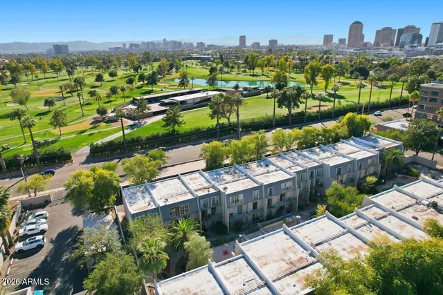 a view of a city with an ocean view