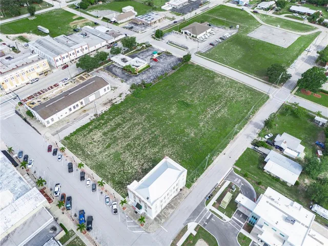 a view of a balcony with floor to ceiling window