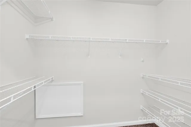 a view of small space with racks on the wall