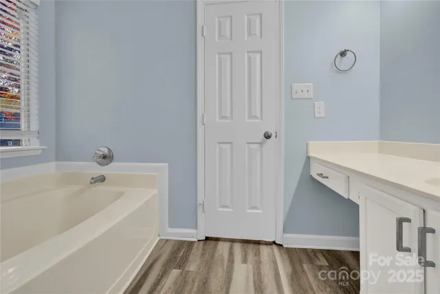 a bathroom with a bathtub