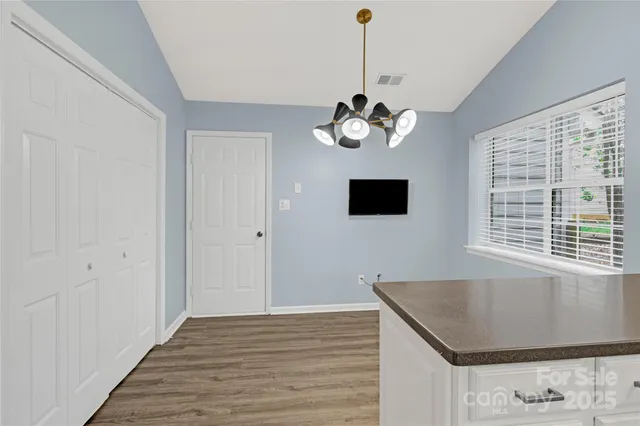a view of a livingroom with a chandelier