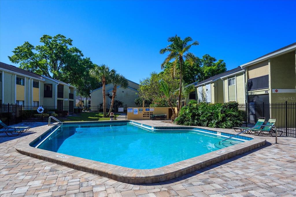 908 Lake Destiny Road, Unit E Altamonte Springs, FL 32714 - Photo 20 of 20 a view of a house with swimming pool and sitting area