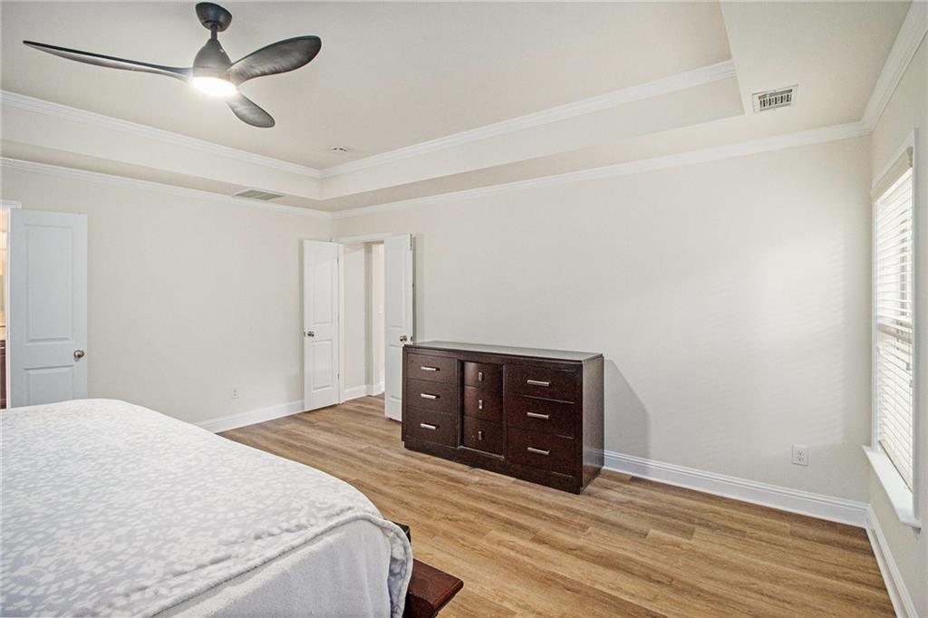 218 Third Avenue Avondale Estates, GA 30002 - Photo 20 of 26 a bedroom with a bed and a ceiling fan
