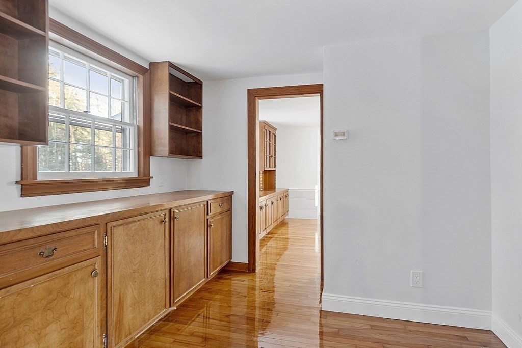 560 County Road Ashby, MA 01431 - Photo 17 of 40 an entryway with wooden floor and cabinet