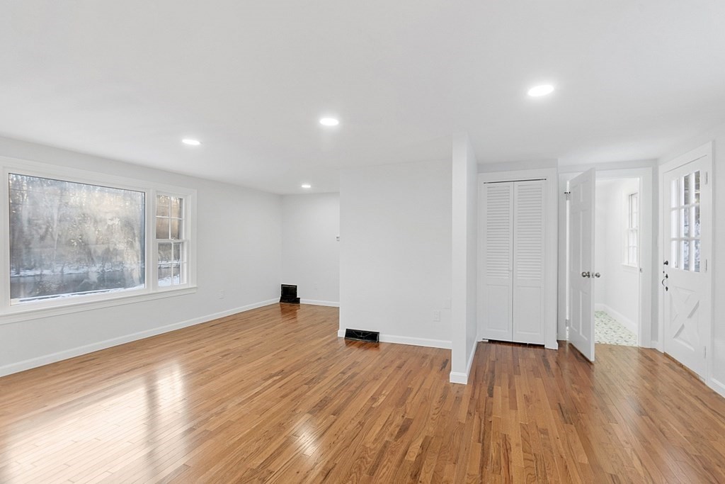 560 County Road Ashby, MA 01431 - Photo 21 of 40 a view of empty room with wooden floor and fan