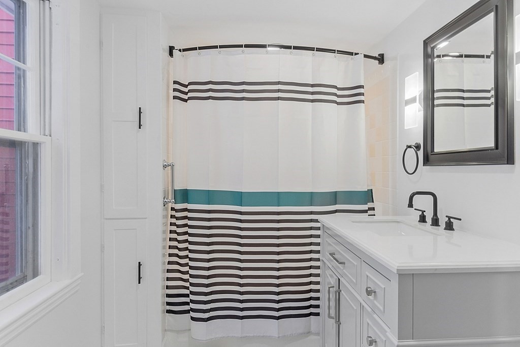 560 County Road Ashby, MA 01431 - Photo 24 of 40 a bathroom with a sink and a mirror