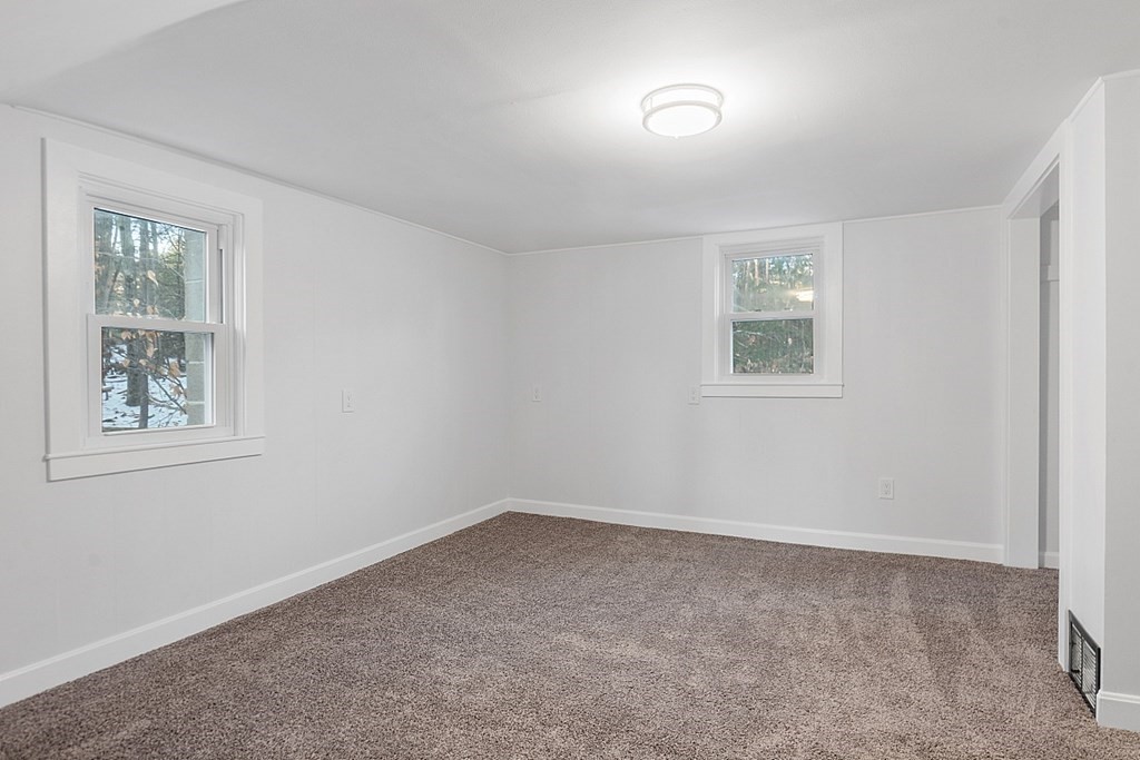 560 County Road Ashby, MA 01431 - Photo 25 of 40 an empty room with windows