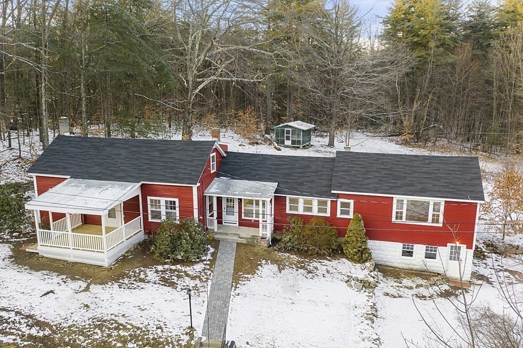 560 County Road Ashby, MA 01431 - Photo 32 of 40 front view of a house with a yard