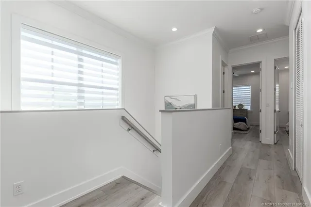 a bathroom with a double vanity sink toilet and shower