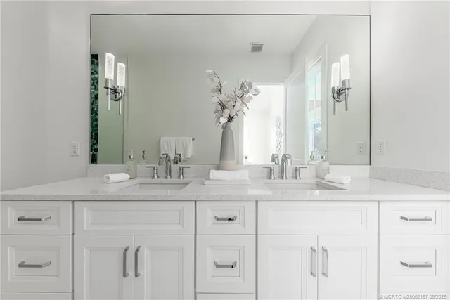 a view of a house with a yard and plants