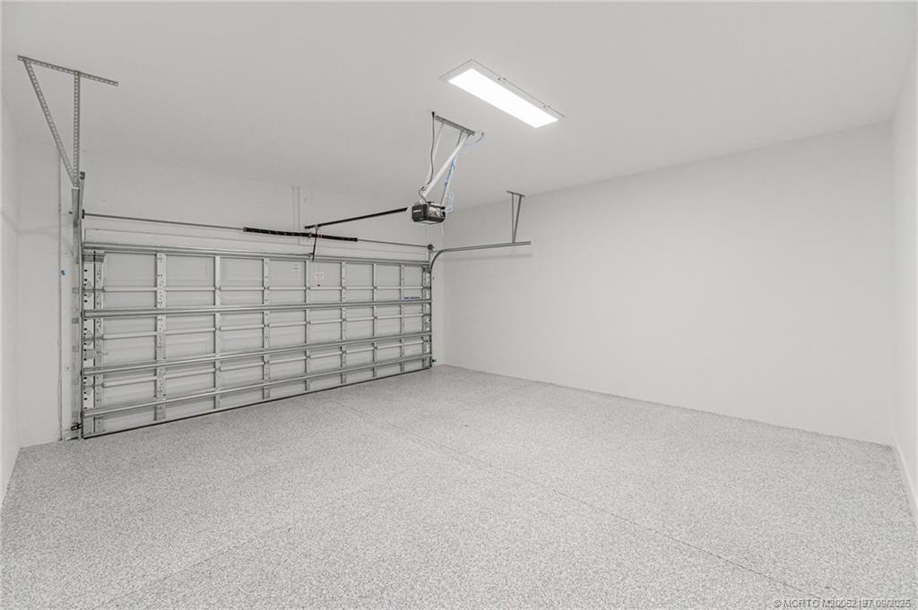 4674 Southeast Manatee Terrace Stuart, FL 34997 - Photo 53 of 55 a view of a garage