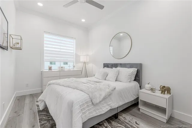 a front view of a house with a yard table and chairs
