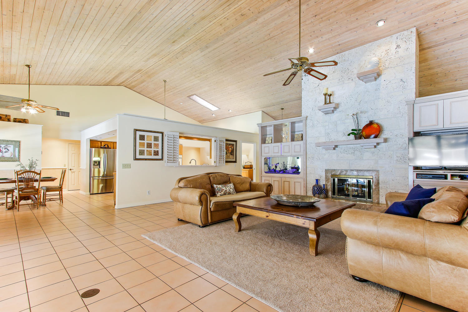 6282 Wood Lake Road Jupiter, FL 33458 - Photo 5 of 25 Huge Open Living Room w Fireplace