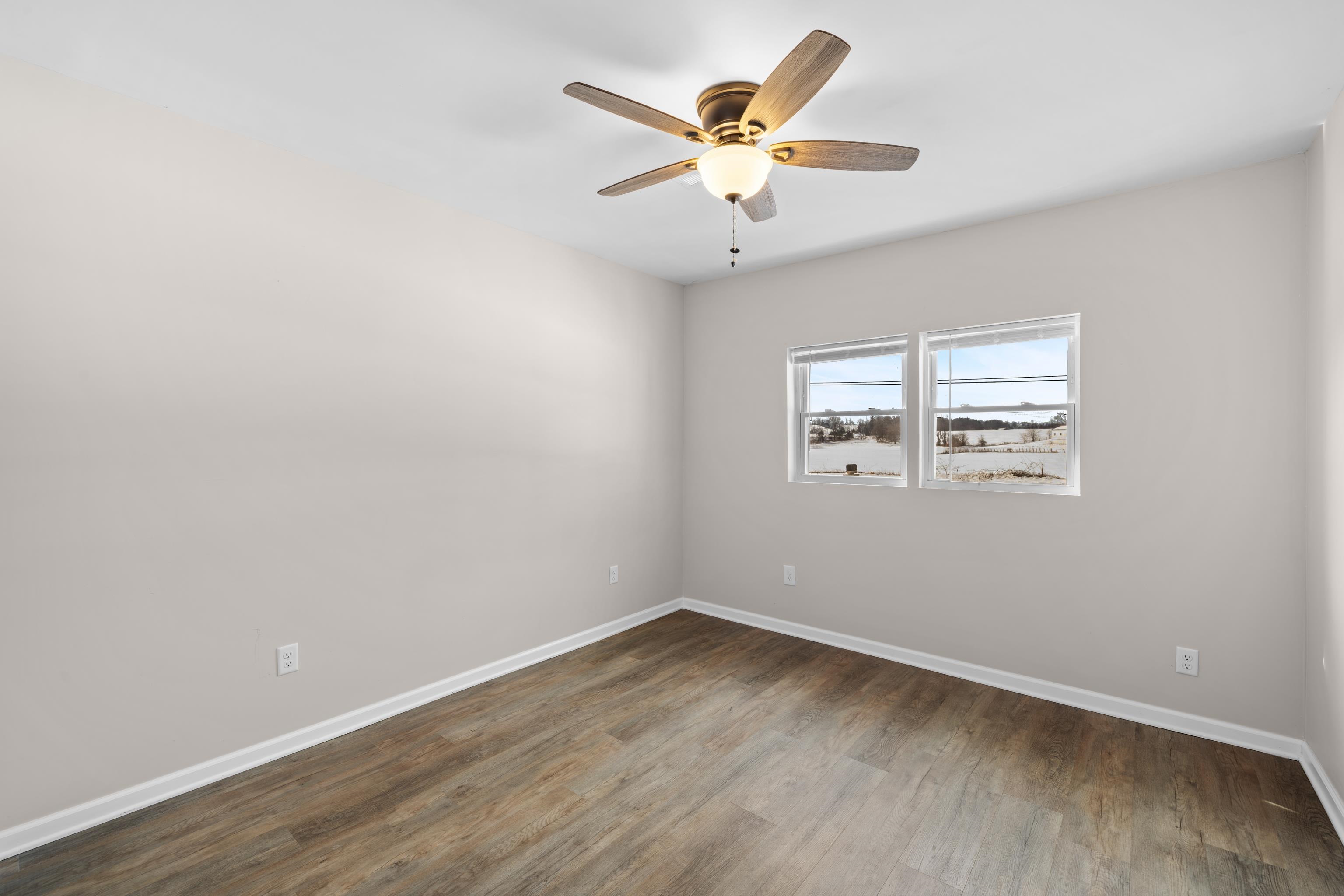 7540 Spring Creek Road Bridgewater, VA 22812 - Photo 15 of 42 an empty room with a window