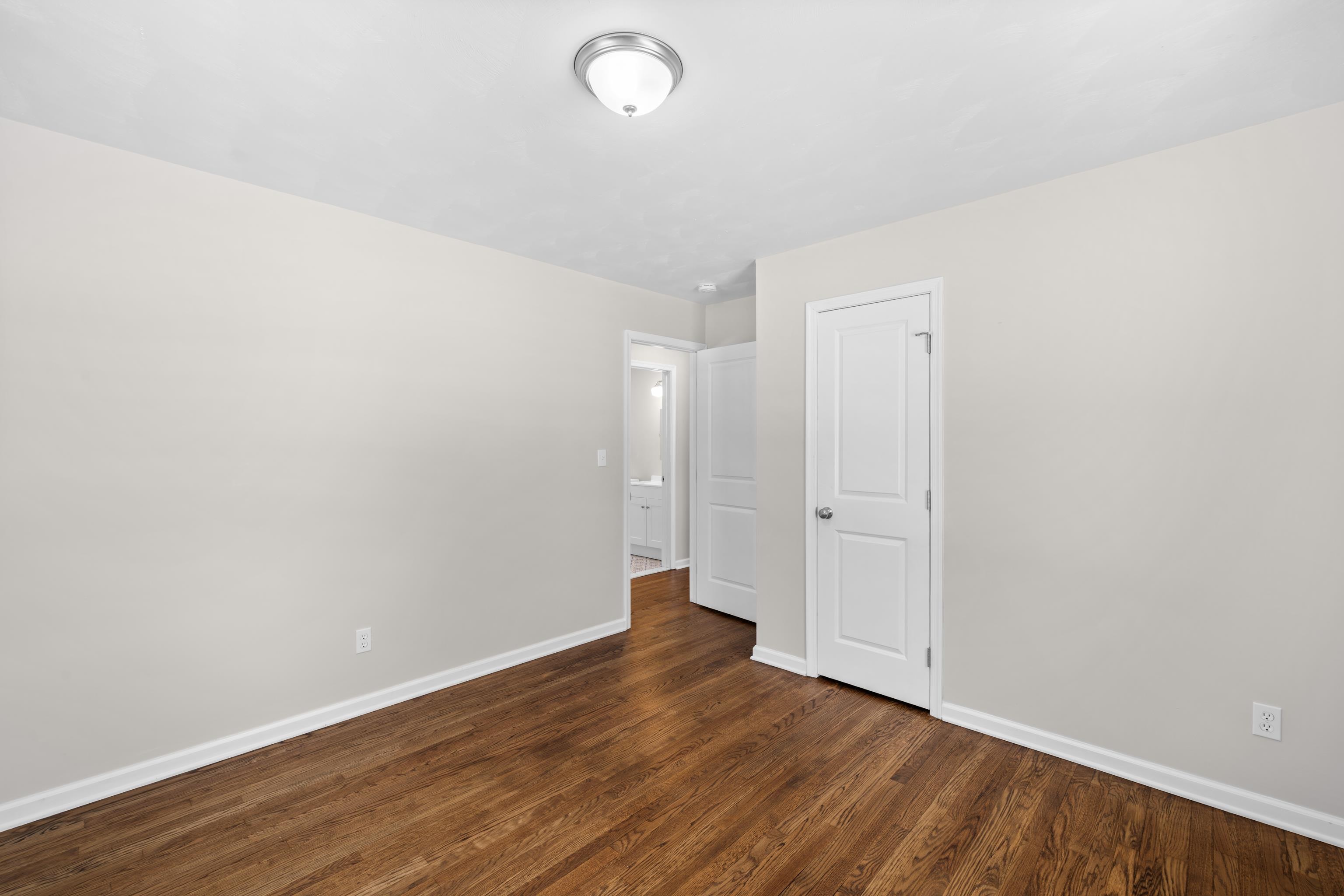 7540 Spring Creek Road Bridgewater, VA 22812 - Photo 18 of 42 a view of an empty room with wooden floor