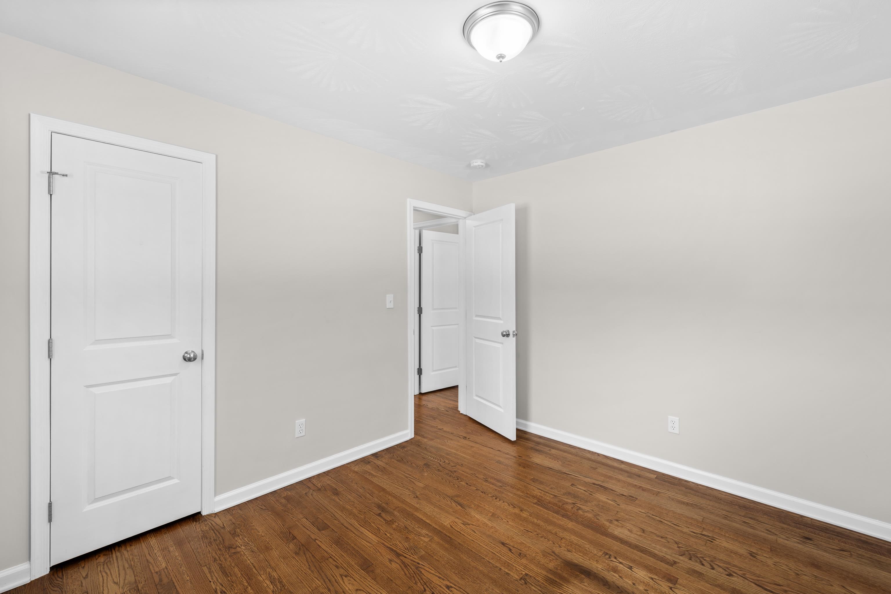 7540 Spring Creek Road Bridgewater, VA 22812 - Photo 22 of 42 a view of an empty room with wooden floor