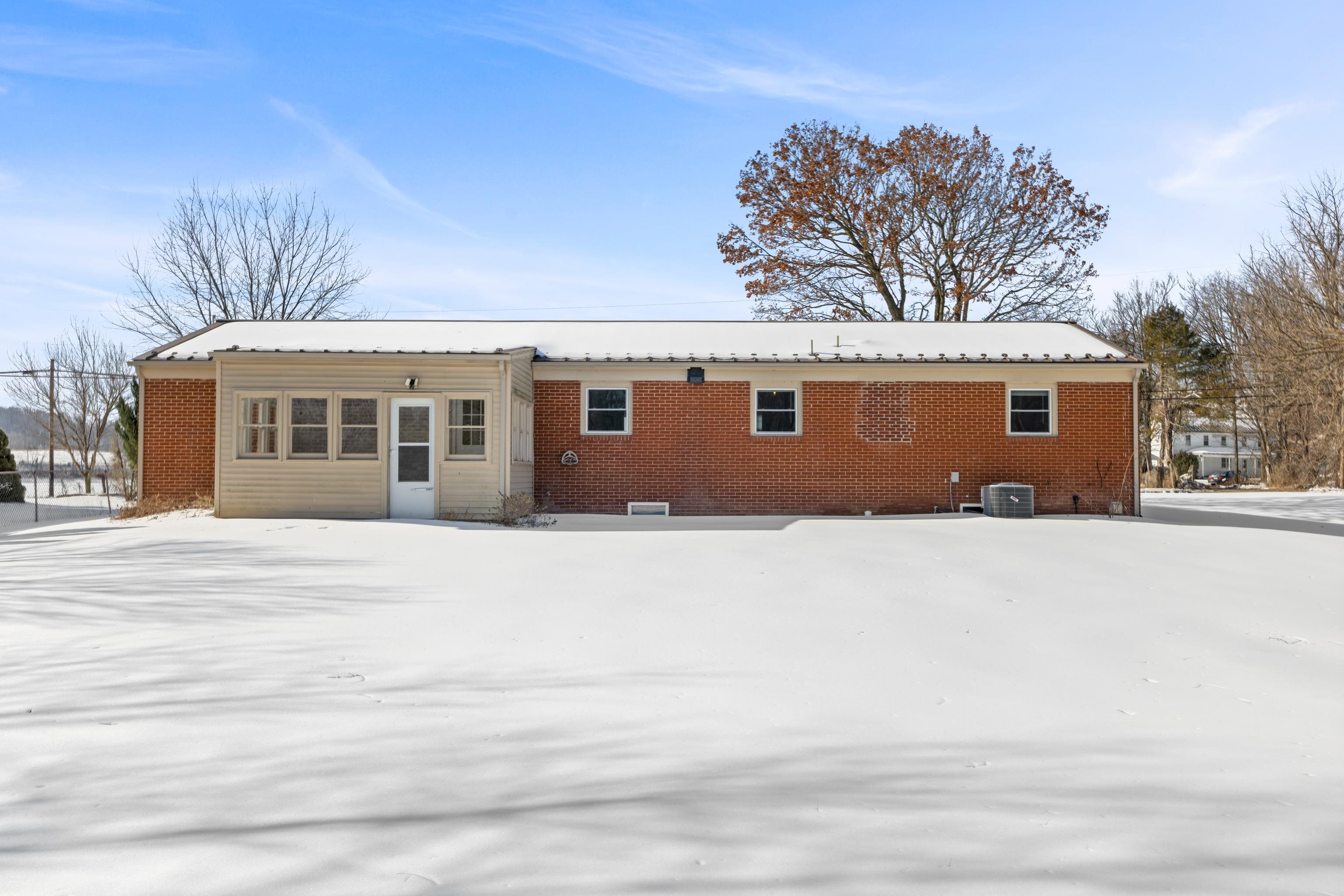 7540 Spring Creek Road Bridgewater, VA 22812 - Photo 37 of 42 a front view of a house with a garden