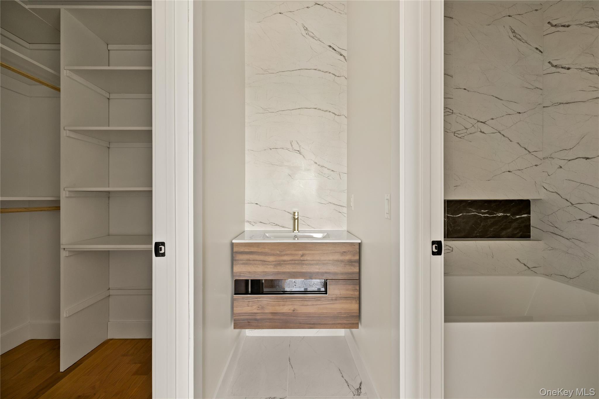 7 Valley Way, Unit 321 Spring Valley, NY 10977 - Photo 26 of 41 a view of a hallway with washer and dryer