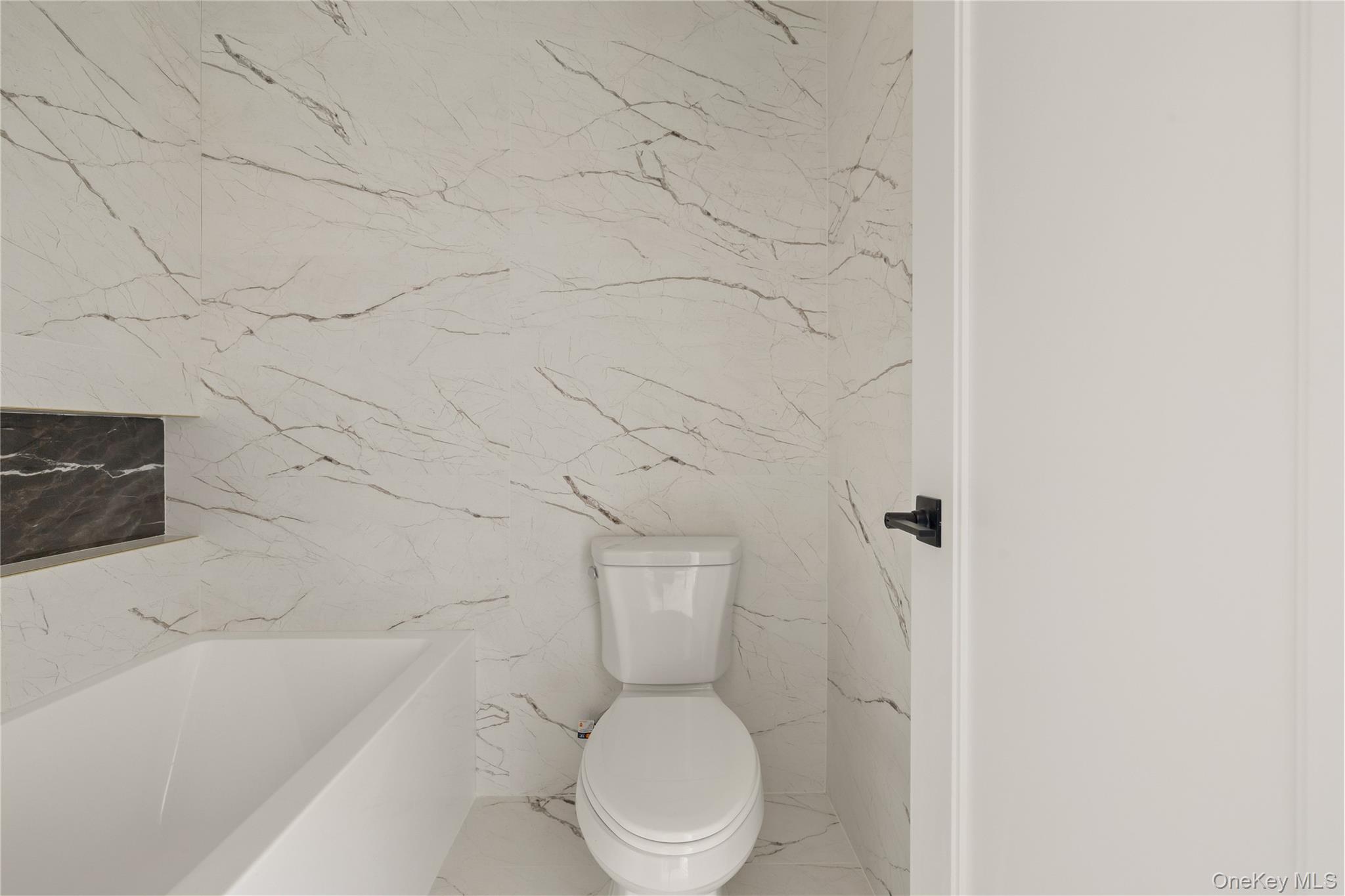 7 Valley Way, Unit 321 Spring Valley, NY 10977 - Photo 28 of 41 a white toilet sitting next to a white cabinet