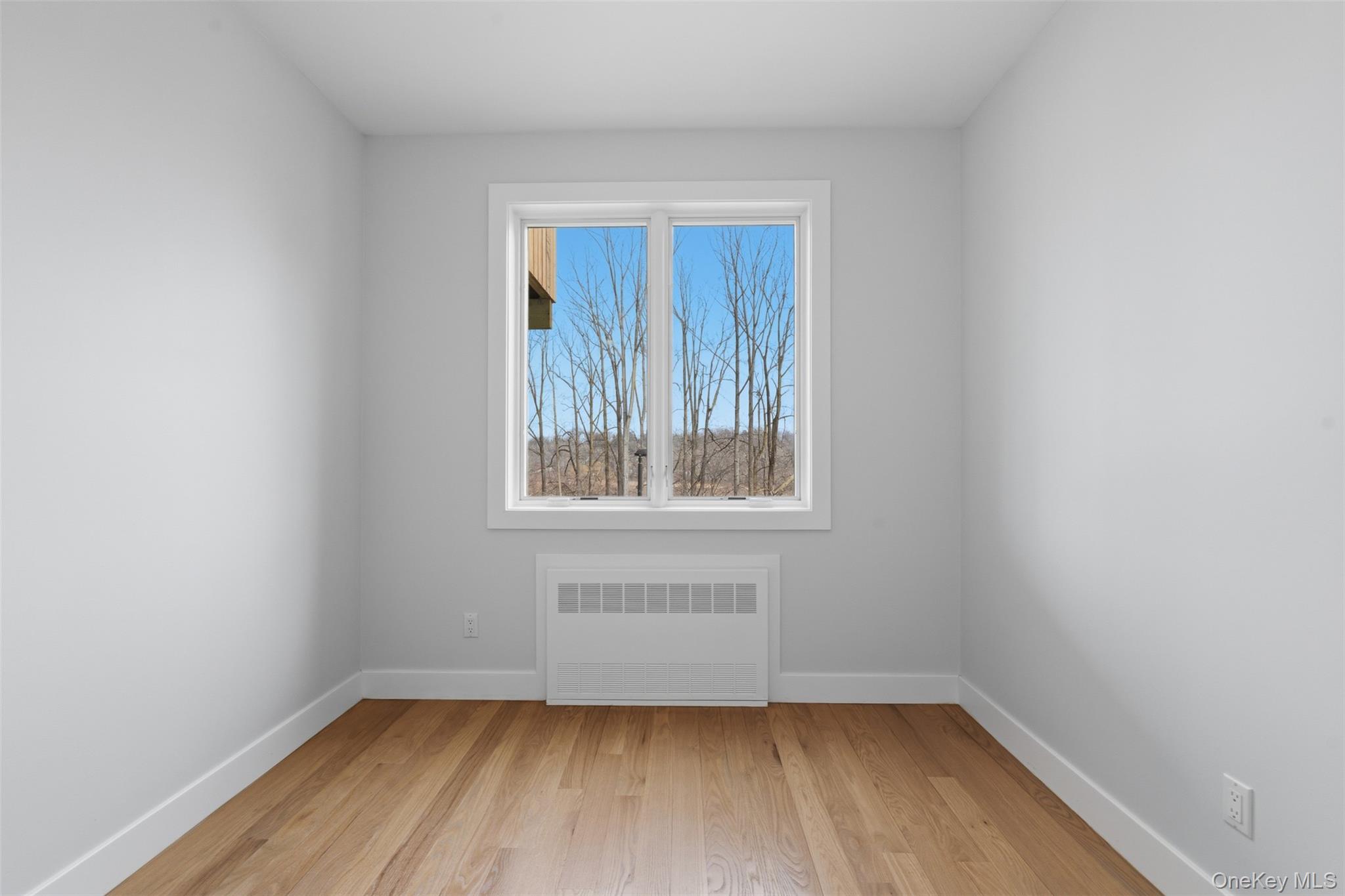 7 Valley Way, Unit 321 Spring Valley, NY 10977 - Photo 43 of 50 a view of a small space with wooden floor and a window