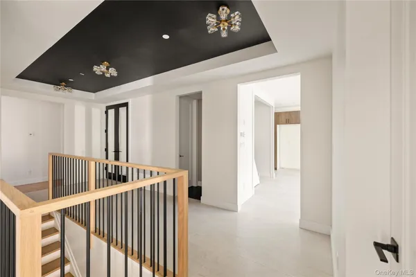 a view of hallway with stairs