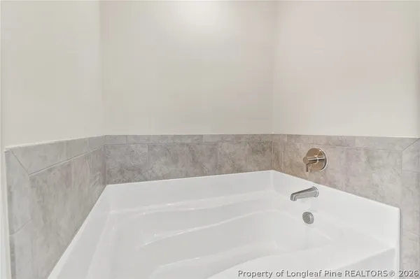a bathroom with bathtub