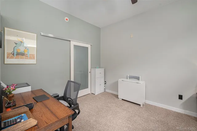 a view of workspace with a couch