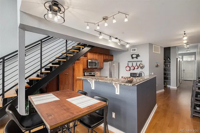a kitchen with granite countertop lots of counter top space