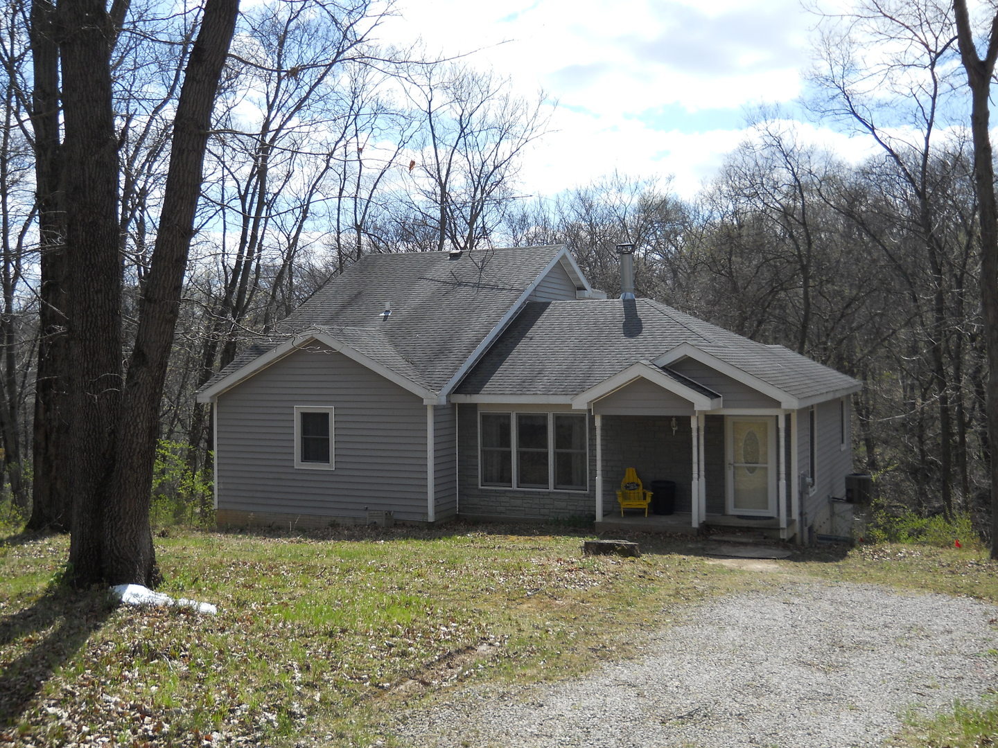 7 Cedar Lane Putnam, IL 61560 - Photo 1 of 11 a view of a house with a yard and large tree