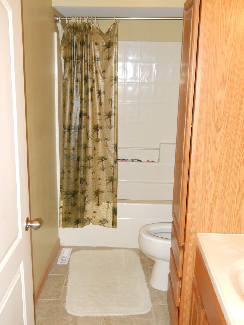 7 Cedar Lane Putnam, IL 61560 - Photo 11 of 11 a bathroom with a shower and a toilet
