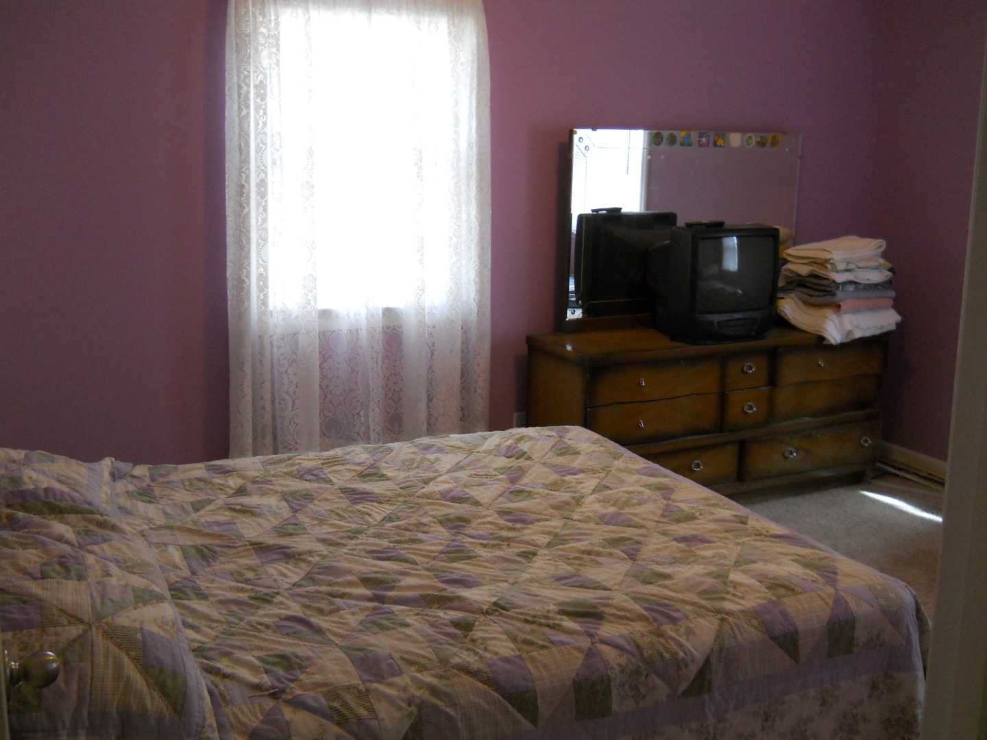 7 Cedar Lane Putnam, IL 61560 - Photo 10 of 11 a bedroom with a bed and window