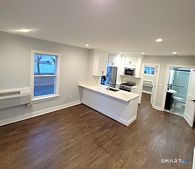 18 Harding Place Danbury, CT 06810 - Photo 2 of 7 a living room with furniture and a wooden floor