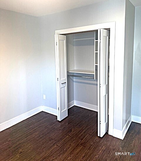 18 Harding Place Danbury, CT 06810 - Photo 5 of 7 a view of empty room with wooden floor