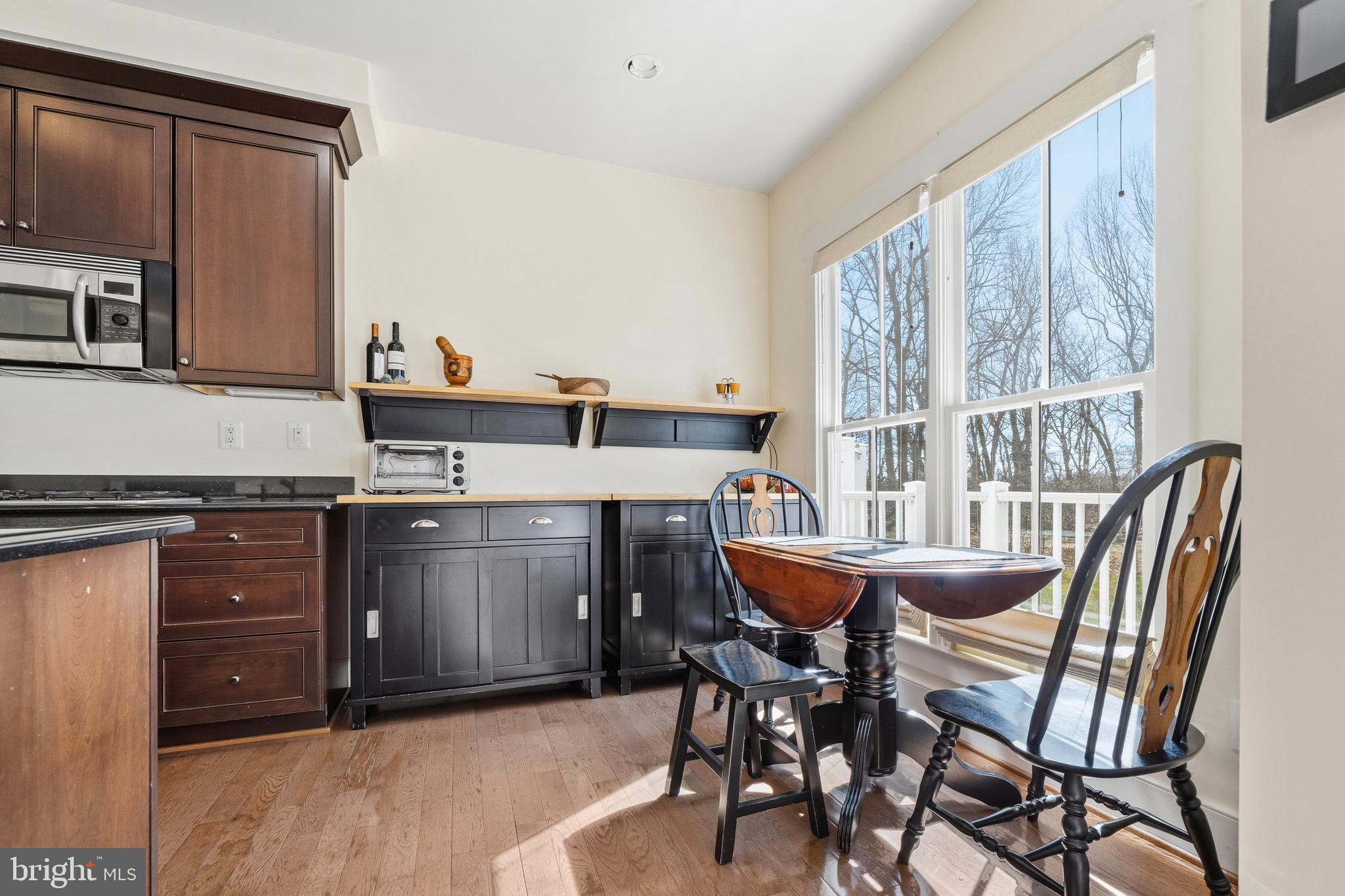 9530 Ament Street Silver Spring, MD 20910 - Photo 12 of 55 a view of a dining room with furniture and window