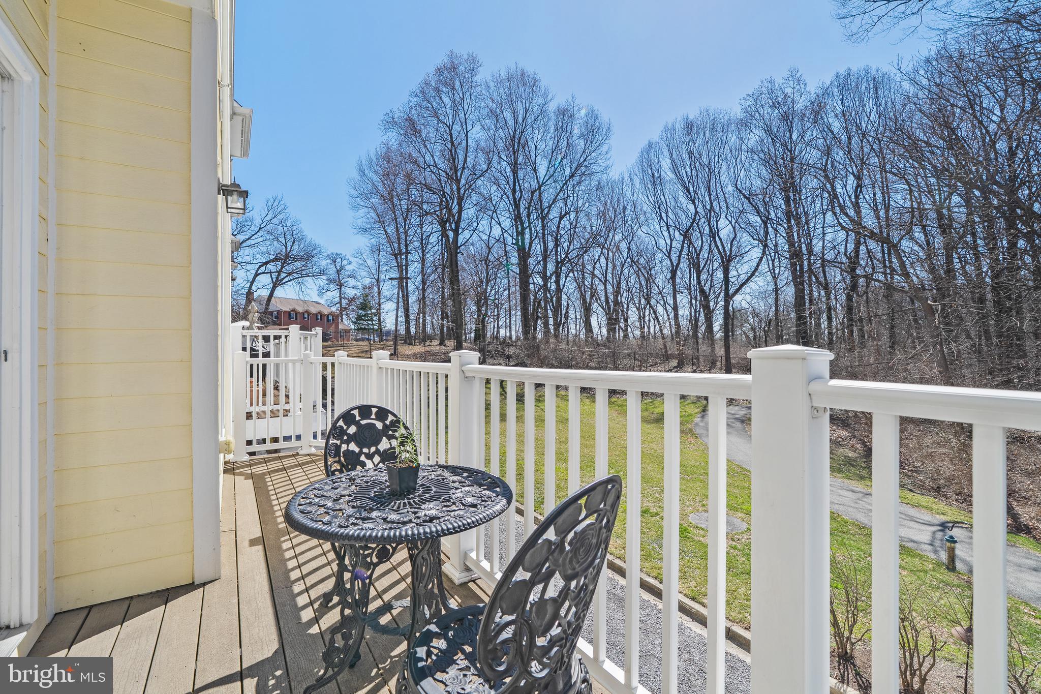 9530 Ament Street Silver Spring, MD 20910 - Photo 13 of 55 a view of a chairs and table in the balcony