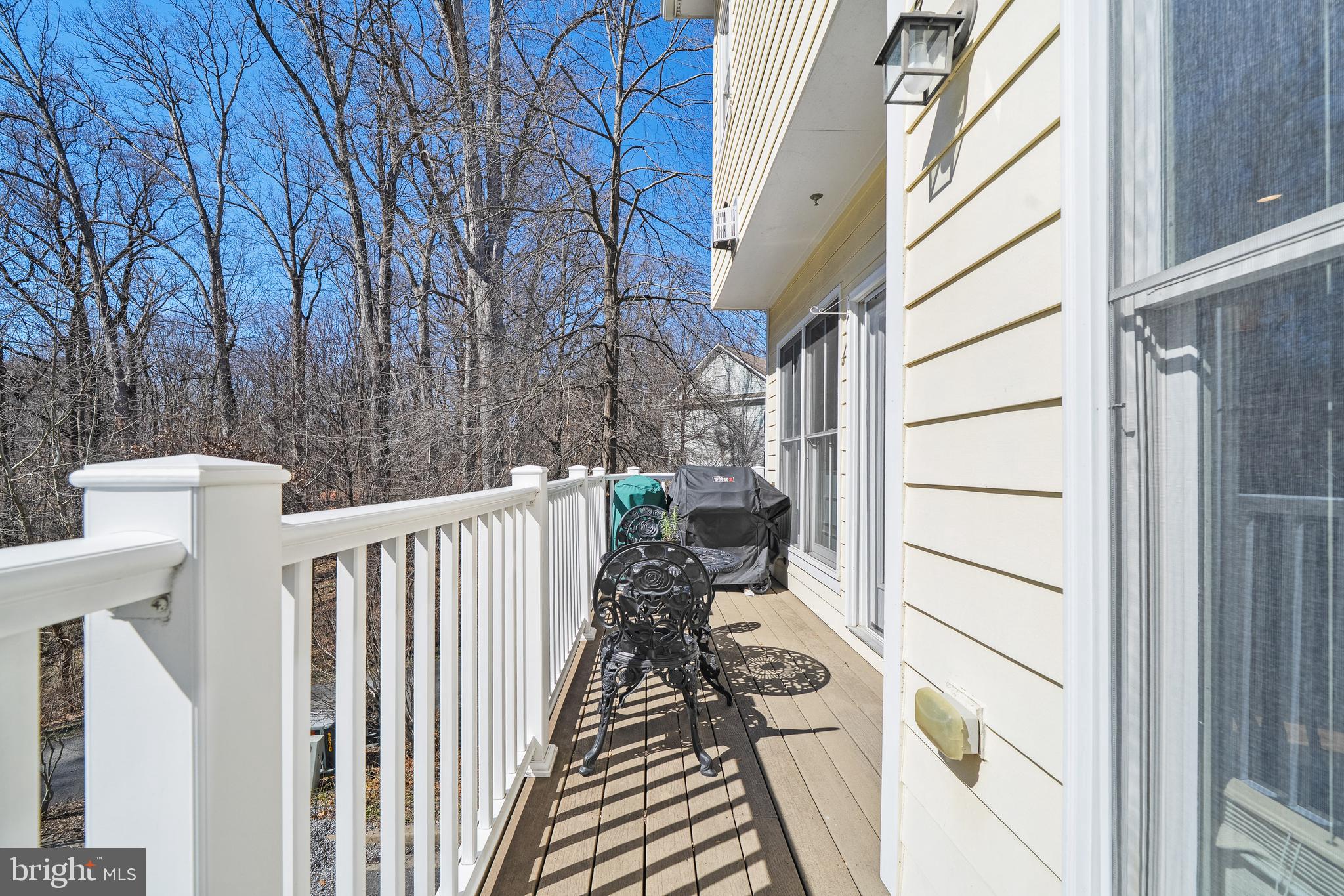 9530 Ament Street Silver Spring, MD 20910 - Photo 14 of 55 a view of a balcony with wooden floor