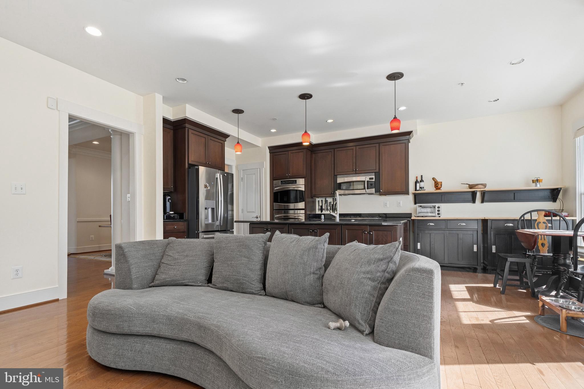 9530 Ament Street Silver Spring, MD 20910 - Photo 15 of 55 a living room with furniture and kitchen view