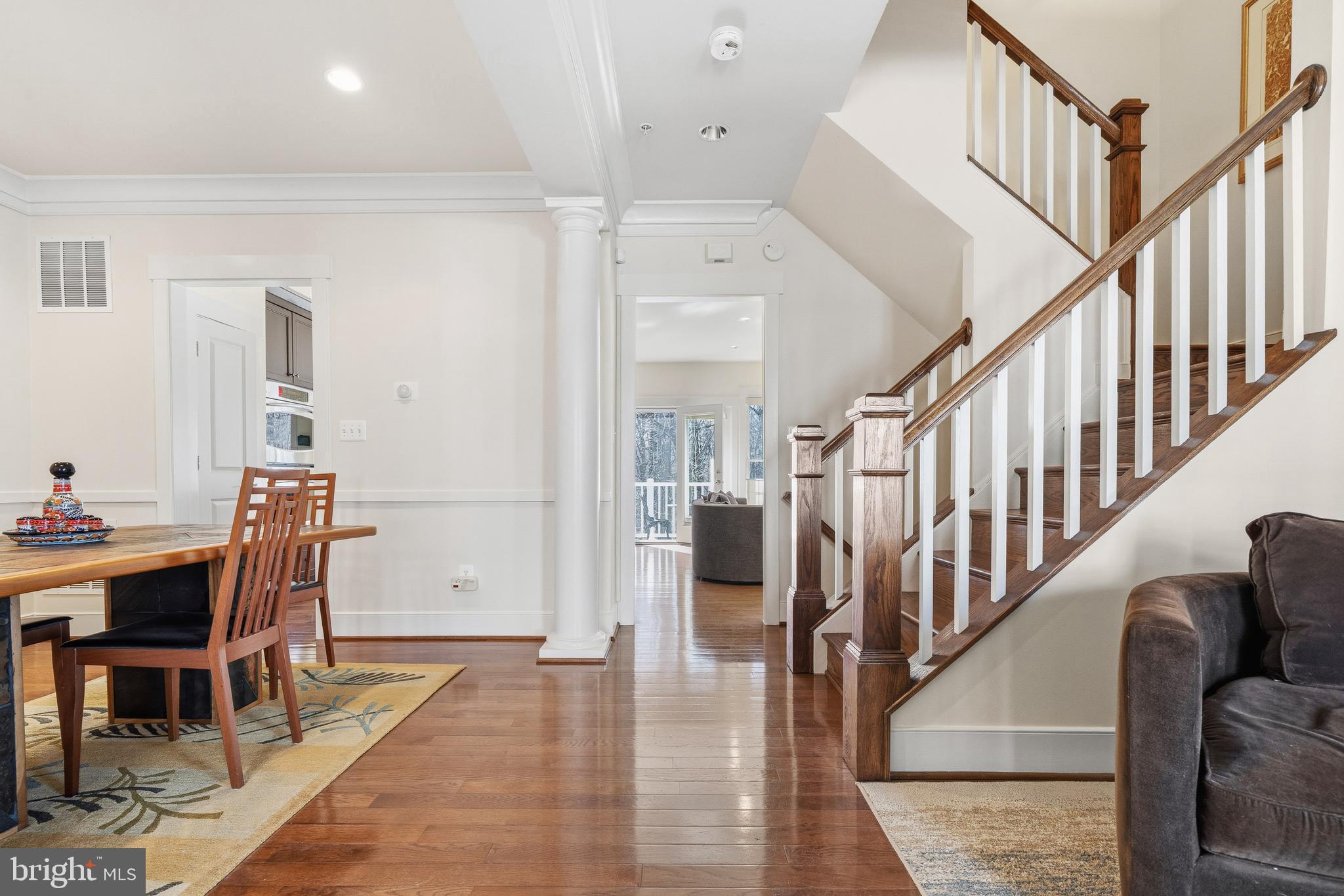 9530 Ament Street Silver Spring, MD 20910 - Photo 18 of 55 a dining room with wooden floor and furniture