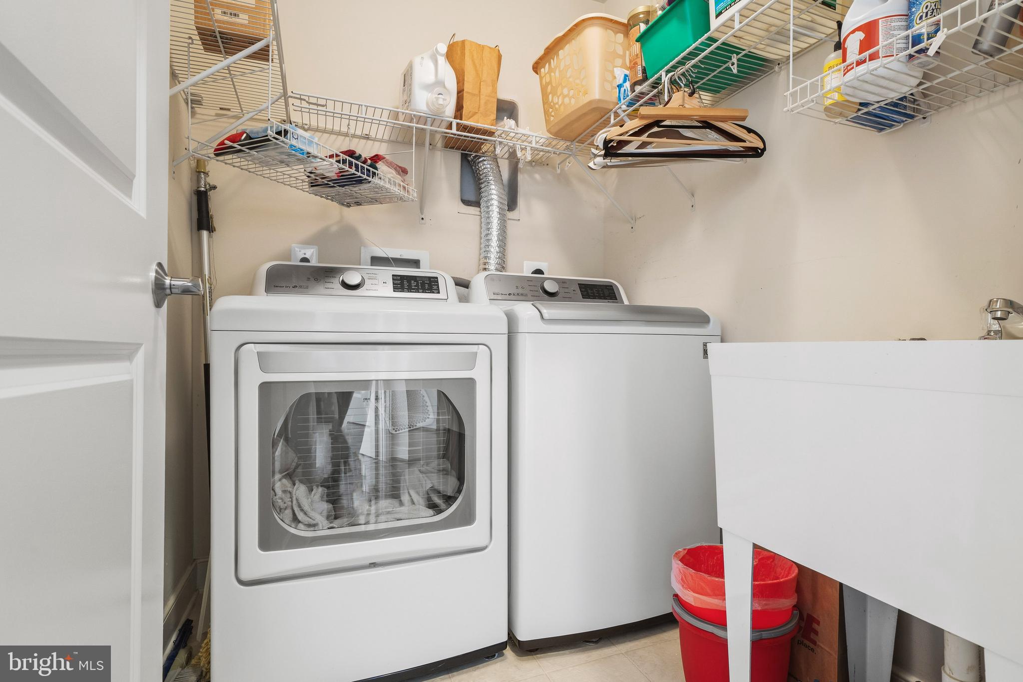9530 Ament Street Silver Spring, MD 20910 - Photo 24 of 55 a utility room with dryer and washer