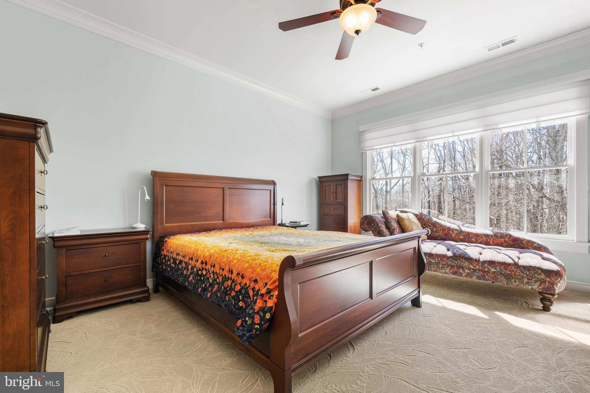 9530 Ament Street Silver Spring, MD 20910 - Photo 25 of 55 a bed sitting in a bedroom next to a window