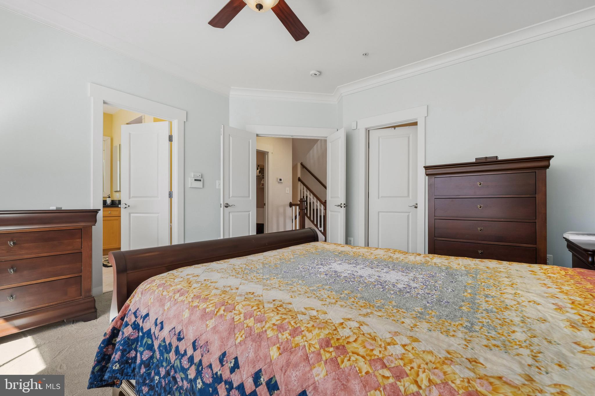 9530 Ament Street Silver Spring, MD 20910 - Photo 26 of 55 a bedroom with a bed and a dresser