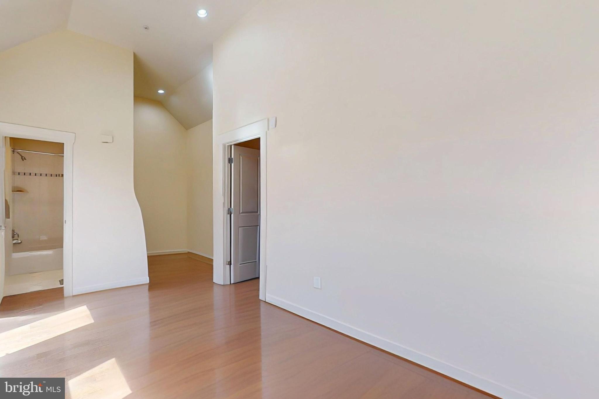 9530 Ament Street Silver Spring, MD 20910 - Photo 33 of 55 a view of entryway with wooden floor