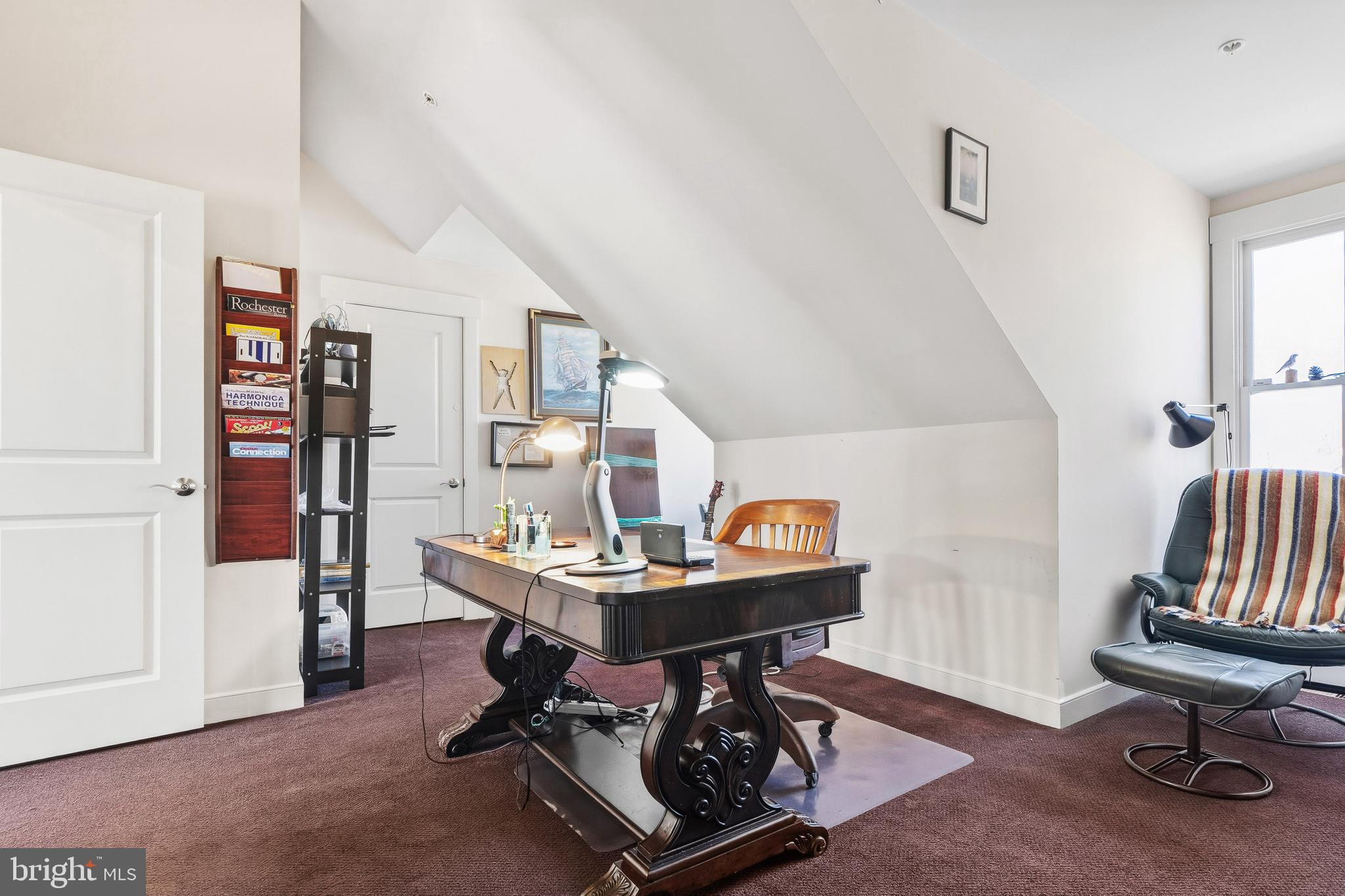 9530 Ament Street Silver Spring, MD 20910 - Photo 36 of 55 a view of a workspace with furniture and a gym