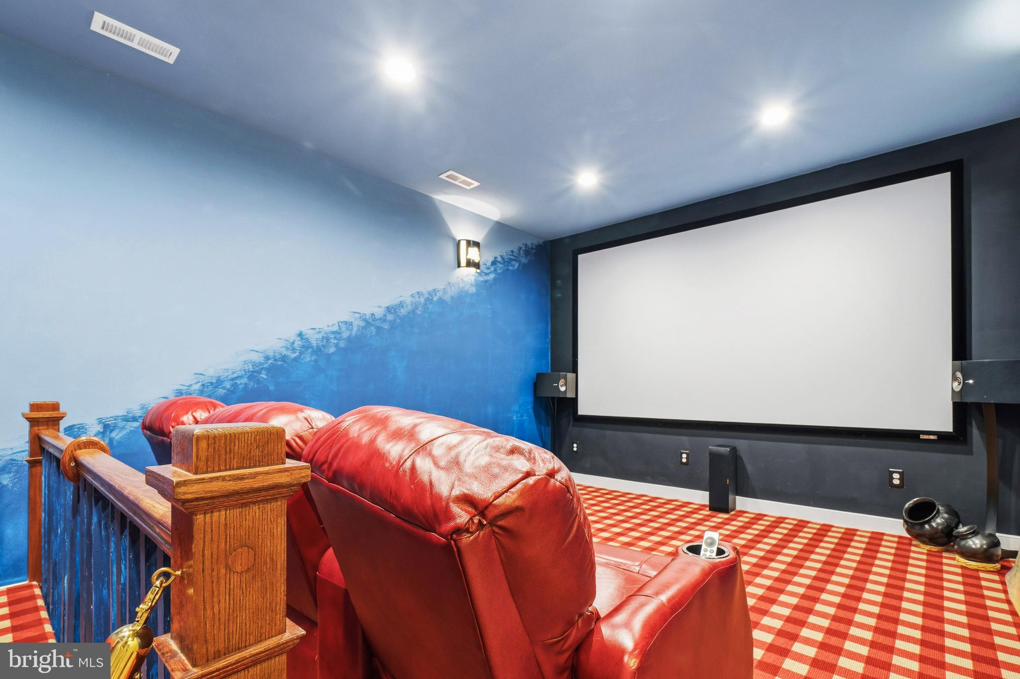 9530 Ament Street Silver Spring, MD 20910 - Photo 41 of 55 a bedroom with a bed and a flat screen tv