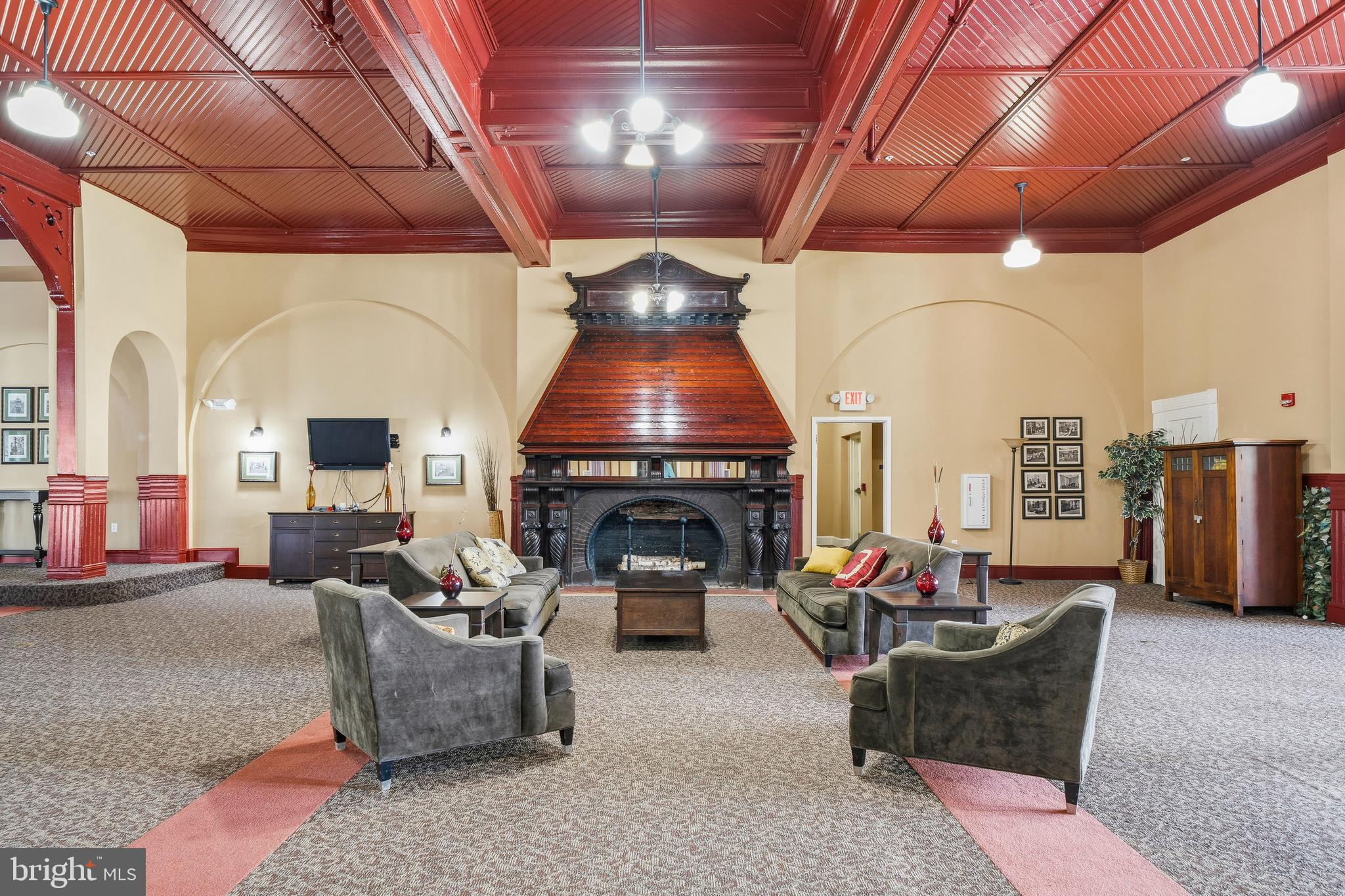9530 Ament Street Silver Spring, MD 20910 - Photo 48 of 55 a living room with furniture and a fireplace