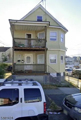 a front view of a house with swimming pool