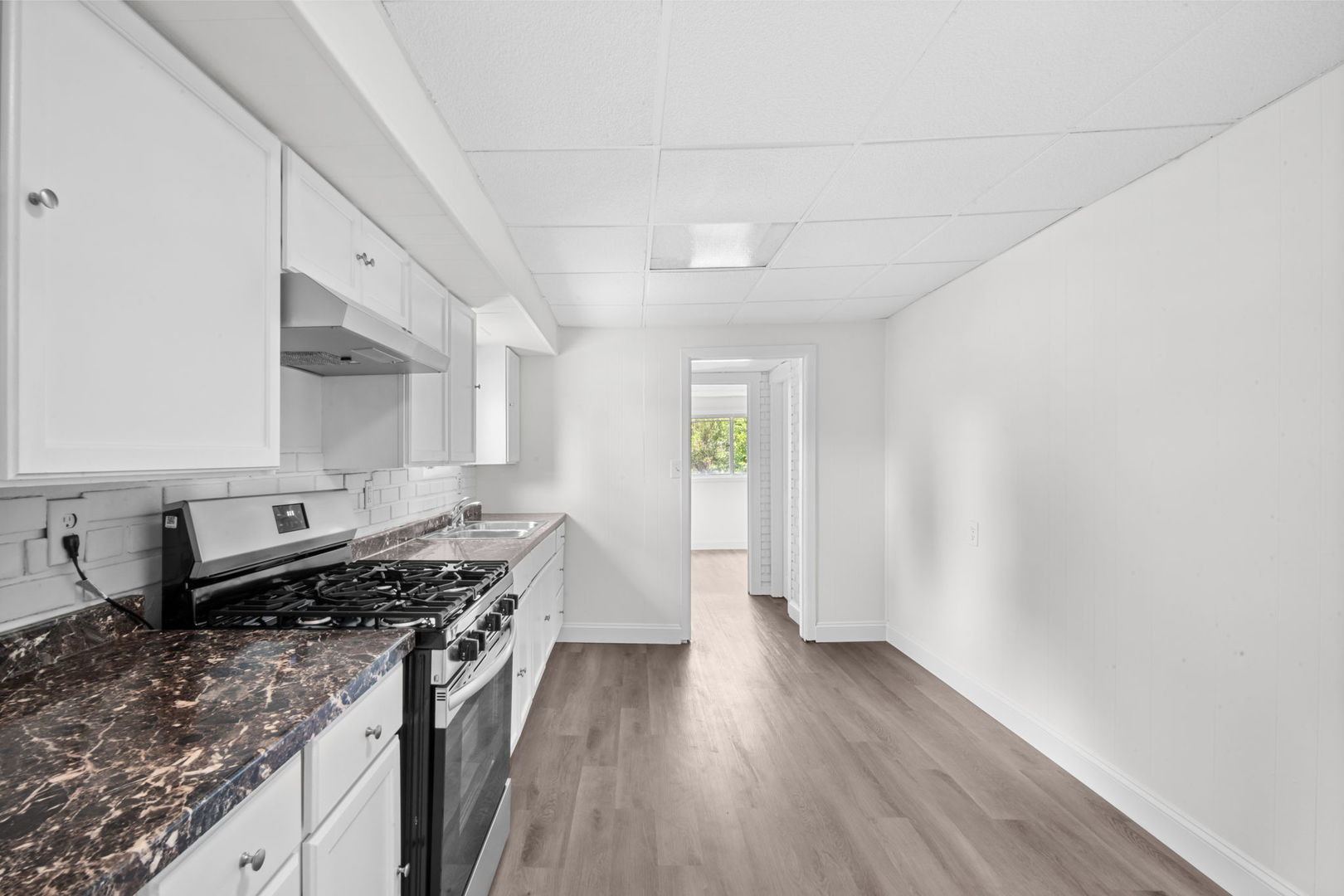 37714 North Nippersink Place Spring Grove, IL 60081 - Photo 11 of 16 a kitchen with stainless steel appliances granite countertop a stove a sink and a refrigerator