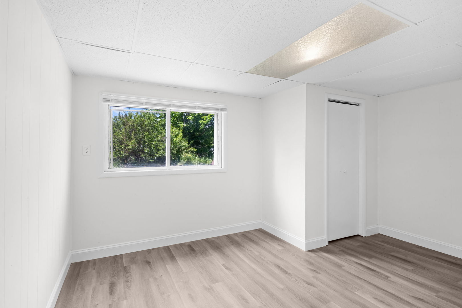 37714 North Nippersink Place Spring Grove, IL 60081 - Photo 13 of 16 an empty room with wooden floor and windows
