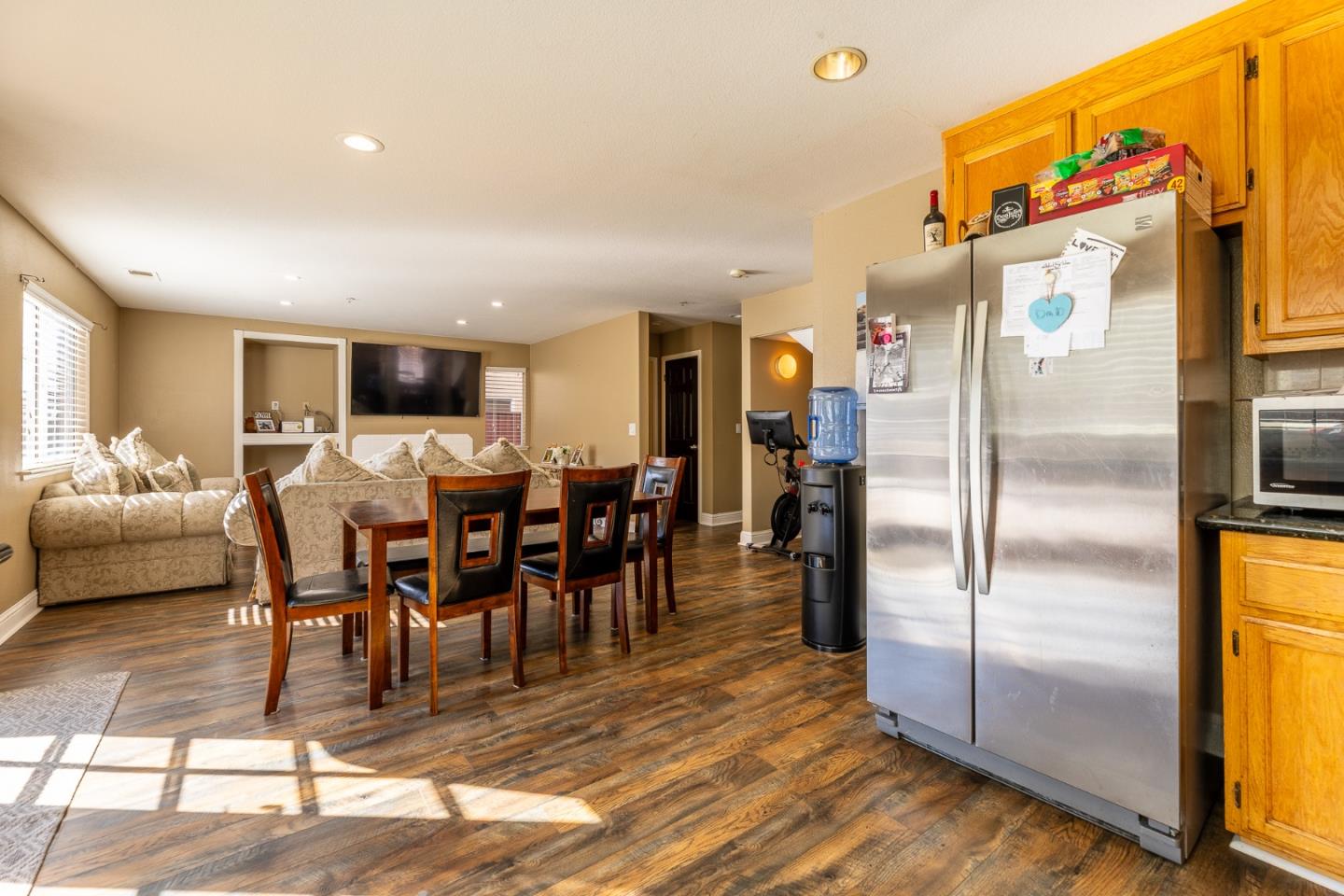 1118 Eagle Drive Salinas, CA 93905 - Photo 14 of 30 a view of a dining area with furniture a kitchen and chandelier
